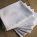 Very nice set of eight large monogrammed French vintage linen damask napkins, PP, hand embroidered monograms