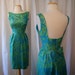 Charming 1950's green silk print cocktail wiggle dress plunging back with bow vlv spring rockabilly - size Small to Medium