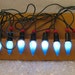 Late 1940s 8 C6 Blue Light Set with Red Wood Ball Holders