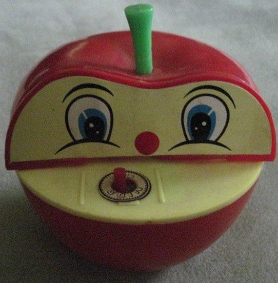 Vintage Red Apple Bank with Worm