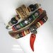 Multi cotton ropes small wooden beads and pottery bead red charm leather bracelet