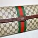 Vintage AUTHENTIC GUCCI Monogram Brown Leather Stripe Clutch
