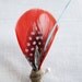 OCHRE Boutonniere in Red and Aqua, with Twine Wrap and Tibetan Silver Feather