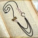 Ribbons and Chains Layering Necklace - f black plated chain, brass mesh bow, glass beads