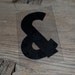 Vintage plastic ampersand & clear and black