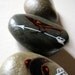 red winged blackbird geometric triangle wing painted stone set