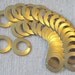 Unusual Raw Brass Double Ring connectors have an Industrial Flair