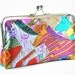 Silk clutch with horses