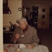 Yes, I Do Bite Retro Photo from the Early 1960s of a Grumpy Looking Man Eating Cake