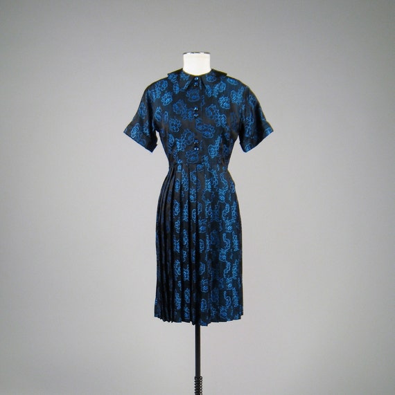 Vintage 1950s blue and black brocaded dress