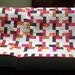 Lap quilt throw 53 X 70 made with Frippery fabrics