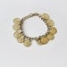 Vintage golden metal cents bracelet.
