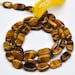 Oval Beads, Golden Tiger Eye Quartz - 10x6 mm - 13''STRAND - 110404-03