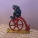 Antique 1900s Cast Iron Bike Riding Frog