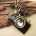 Picture the Beach. a camera necklace