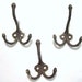 Set of Three Antique Acorn Hooks