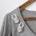Grey wood dweller brooch