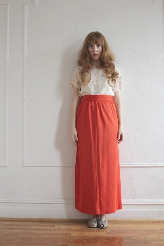 long dramatic orange skirt