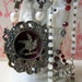 RESERVED for AC - velvet flight - vintage assemblage necklace with relic pendant and mother of pearl rosary by the french circus