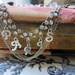 RESERVED for Priscilla - paris by starlight - vintage assemblage necklace with sterling charms, rhinestones and rosary by the french circus