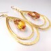 golden double teardrop pendant loop with swarovski crystal copper briolette drop. Free US shipping