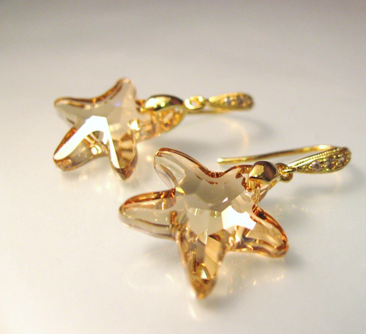 Golden shadow Starfish Swarovski crystal earrings by DesignByKara