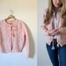 vintage 1950s Peachy Pink Button Sweater Cardigan with Flowers and Drawstring -- S
