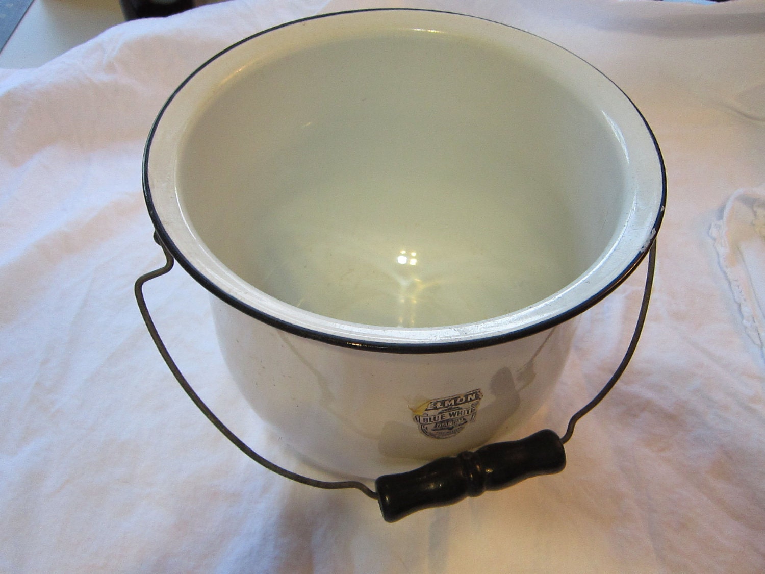 vintage enamel bucket white with black rim and handle