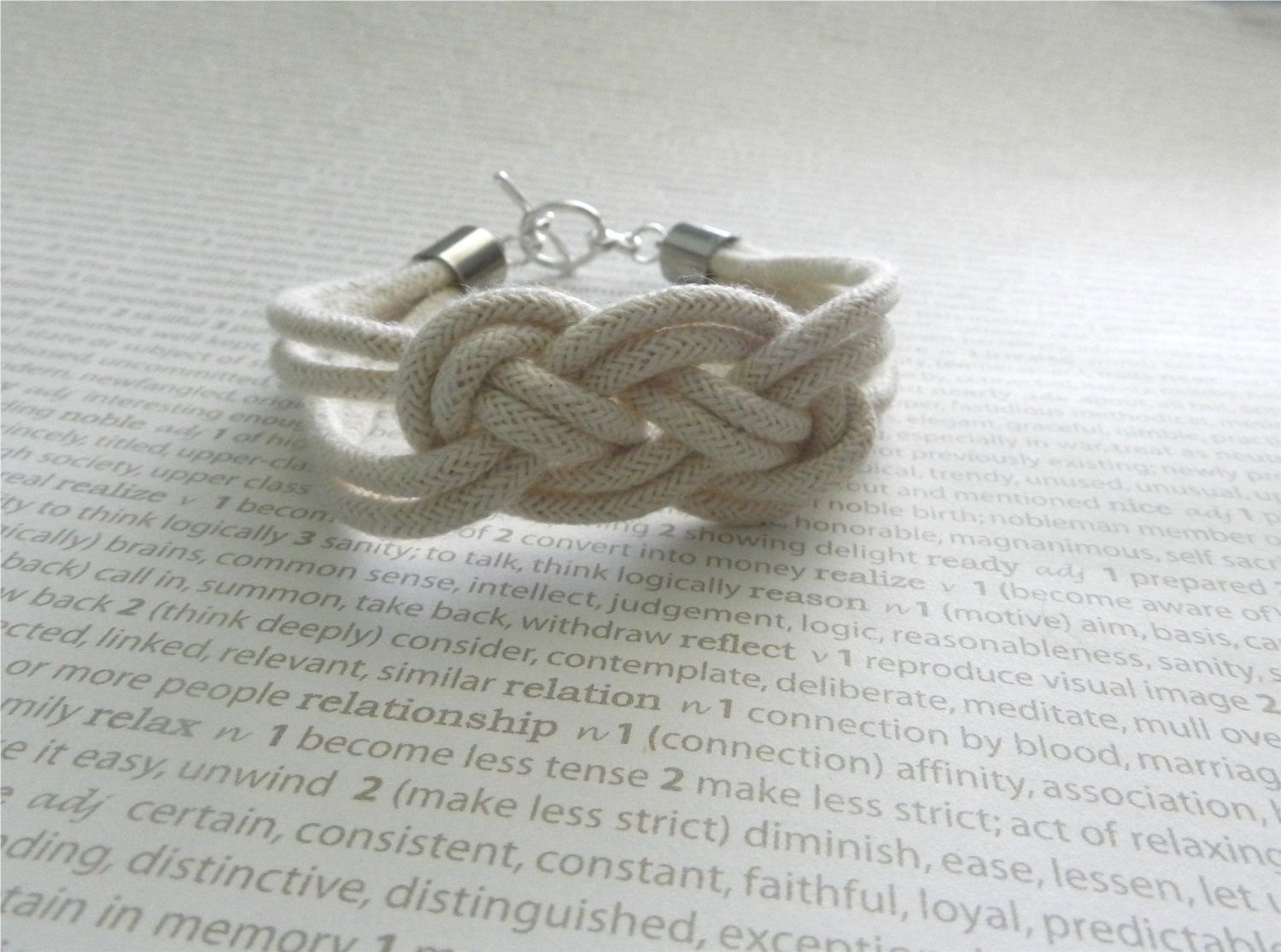 Rope bracelet with silver toggle square knot modern