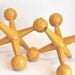 vintage mid century pair of metal jax in yellow // Bill Curry - George Nelson // atomic bookends