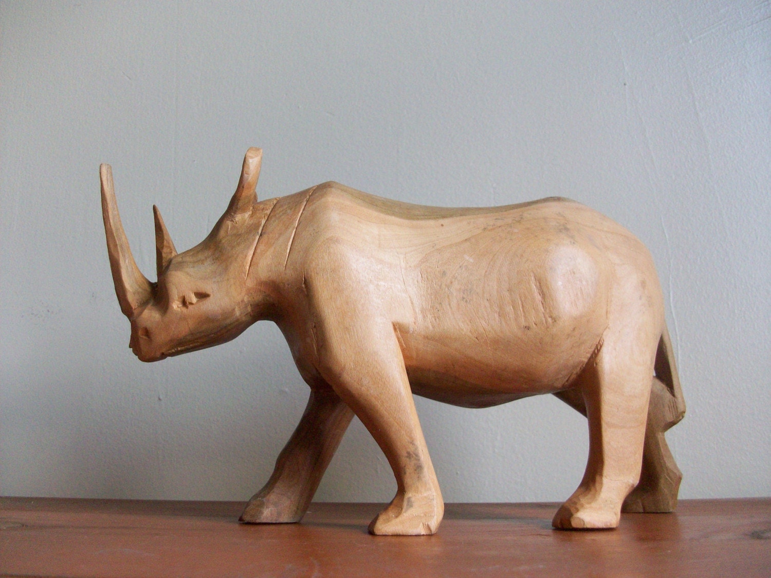 wooden rhino statue