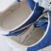 nike white shoes blue swoosh