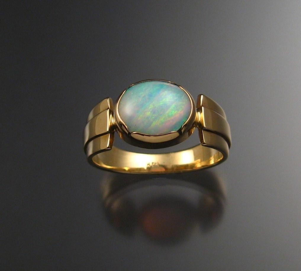 Opal ring 14k gold oval size 8 3/4
