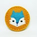 Tiny teal serious fox felt brooch