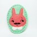 Troubled Charlie of rabbits felt brooch