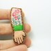 Cavelier arm felt brooch