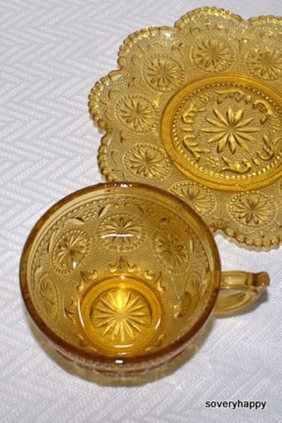 Vintage Amber Glass Tea Cup and Saucer Floral Pattern