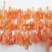 16" long Pink Coral Chips 10mmx1mm Beads