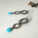 Long blue silver wire wrapped earrings with Turquoise Stone