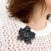 Grey leather flower brooch