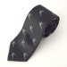 Vintage Silk Neck Tie with Pheasants Pattern Against Dark Green Background