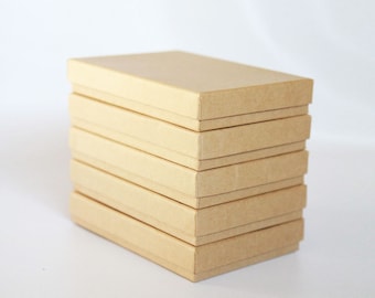 10- Kraft Boxes filled with cotton 7-1/8" x 5-1/8" x 1-1/8"H Works great for photography presentation