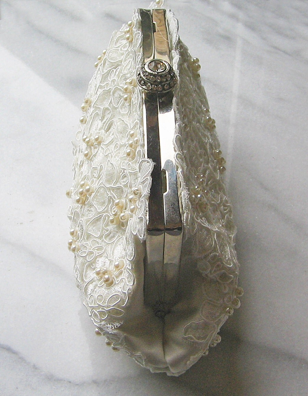 ivory lace clutch