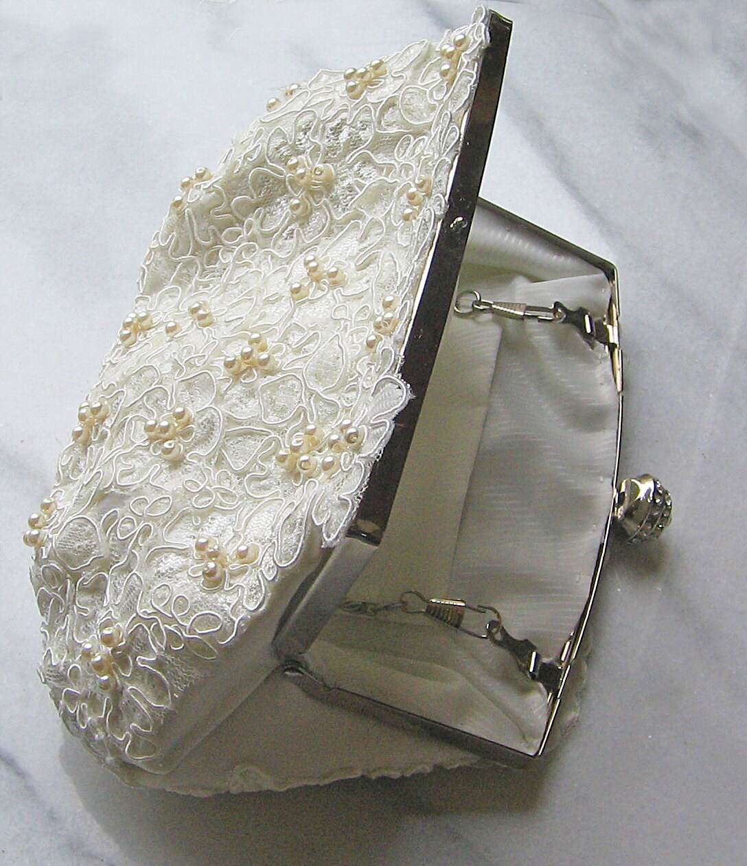 ivory lace clutch