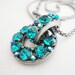 vintage jewelry silvertone necklace with sparkling round turquoise rhinestones pendant