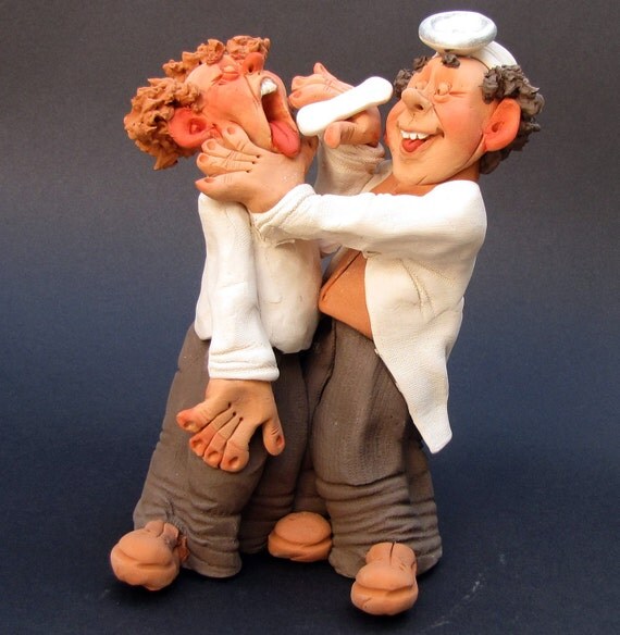 Otolaryngologist Exemines His Patient