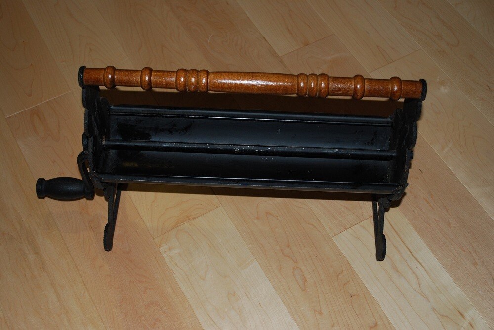 Vintage Cast Iron and Metal Newspaper Log Roller