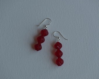 Sterling silver dangle earrings with red glass round dimpled vintage beads