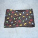 Black with Multi Colored Paw Prints Dog Belly Band - Available in all sizes