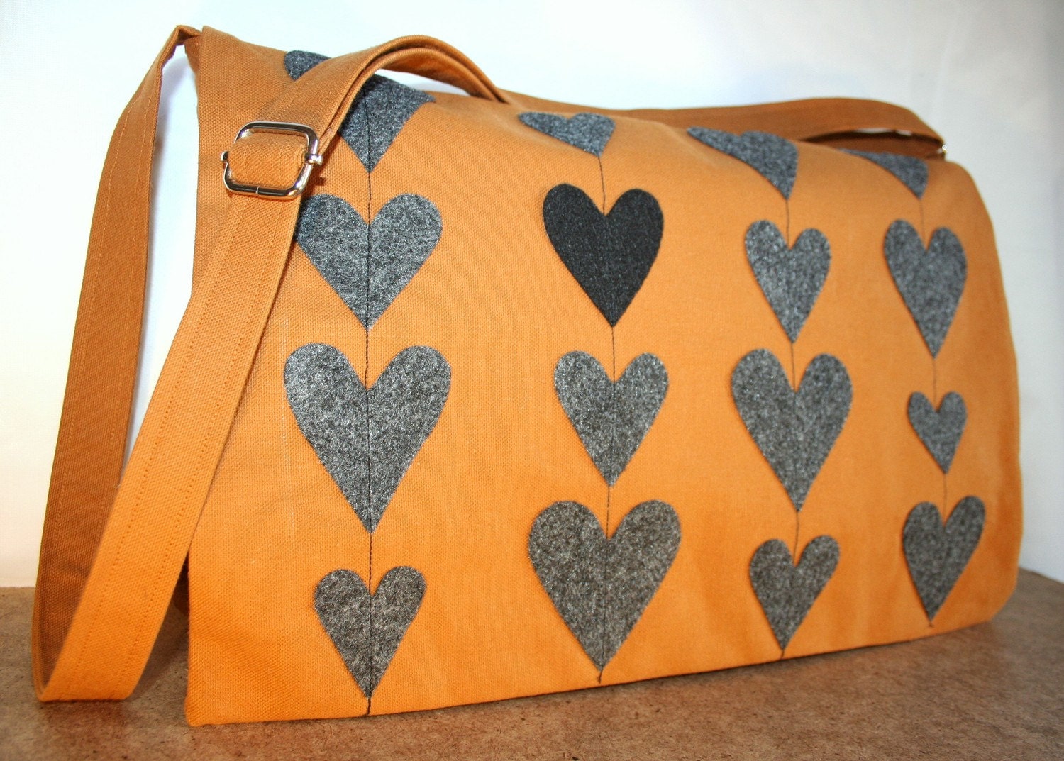 Canvas Messenger bag with adjustable shoulder strap.